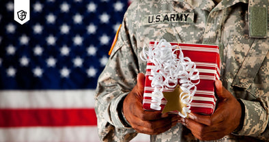 American soldier holding a christmas gift